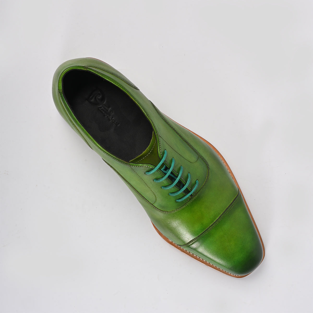 green leather shoe - top