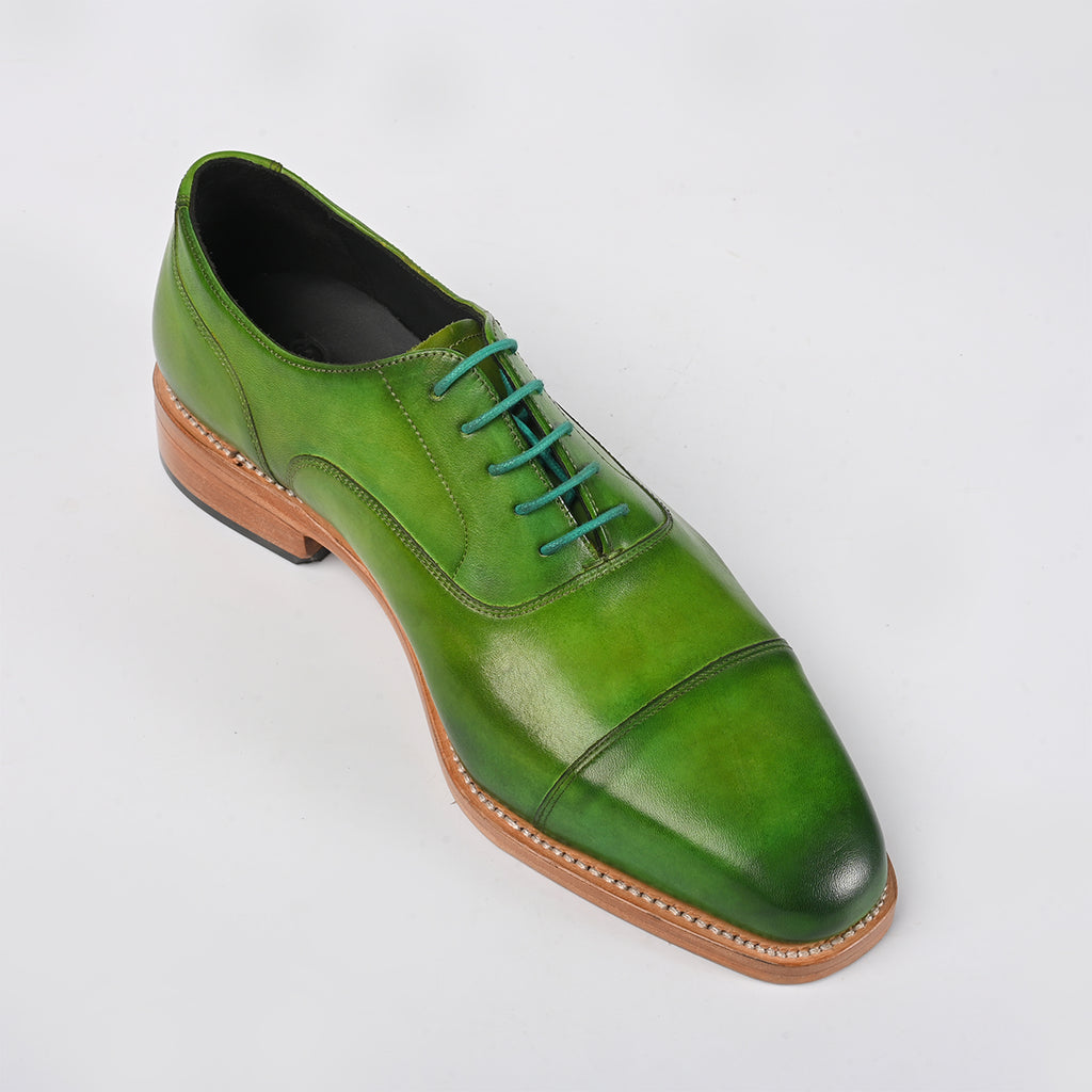 green leather shoe - side
