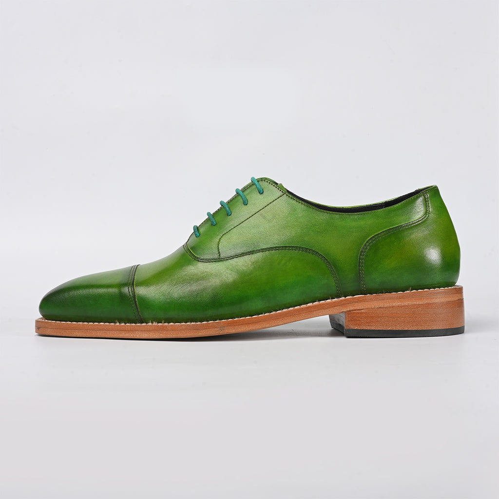 green leather shoe - side
