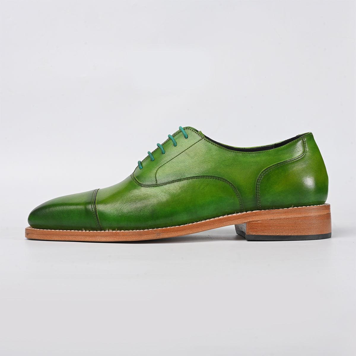 green leather shoe - side